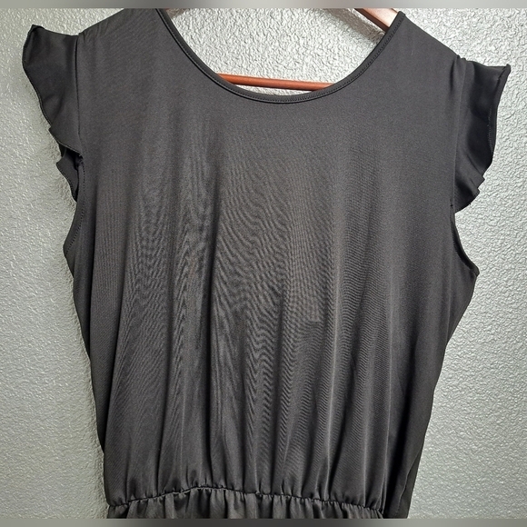 Black Romper With A Ruffled Short/Swimsuit - Picture 5 of 9